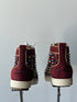 Christian Louboutin
Lou Spikes velvet trainers