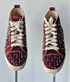 Christian Louboutin
Lou Spikes velvet trainers